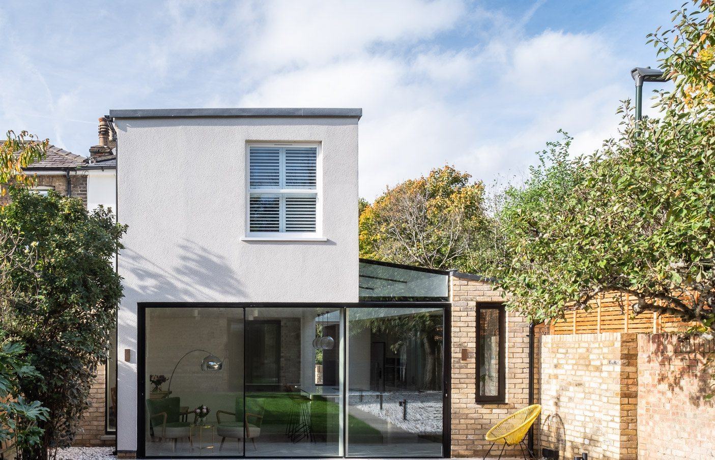 Rear extension with corner sliding doors onto the lawn
