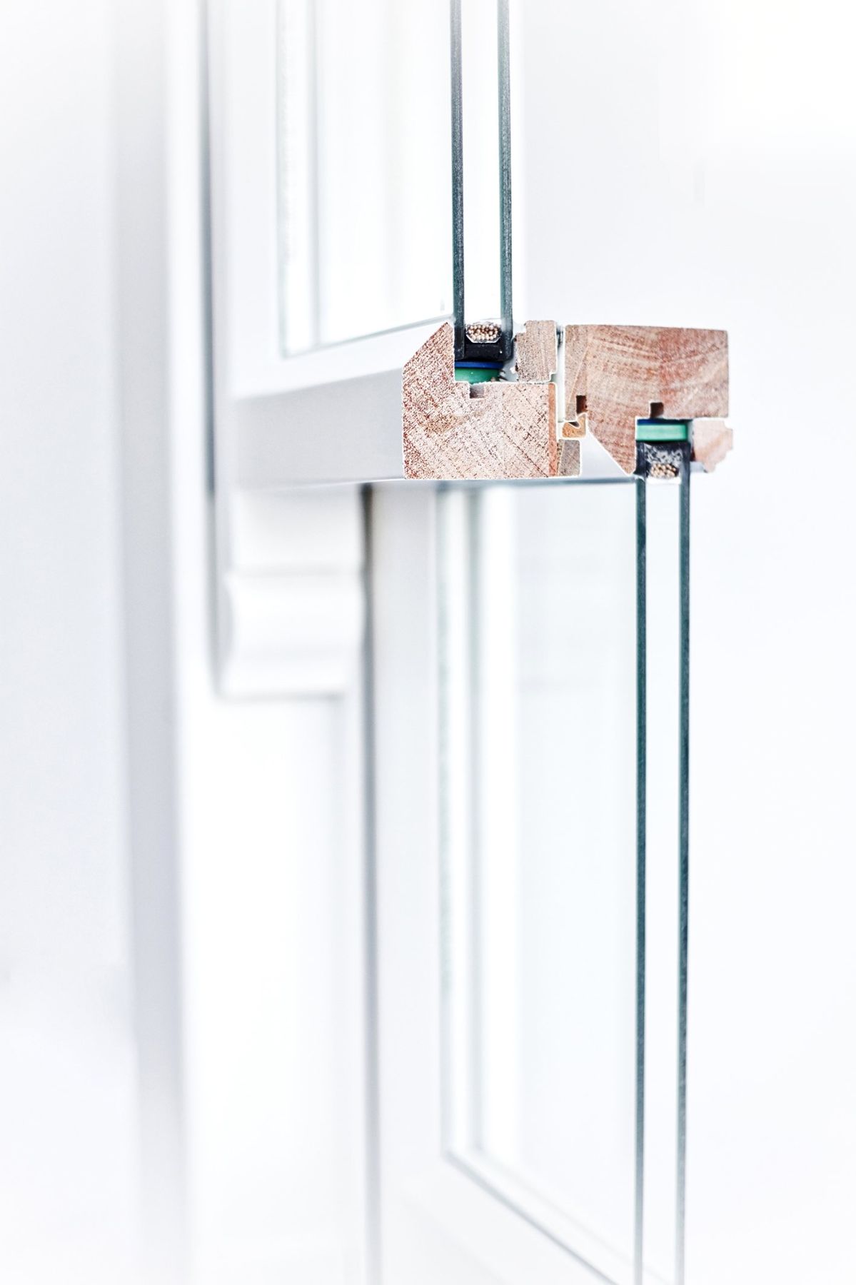 Sash meeting rails cut through with double glazing