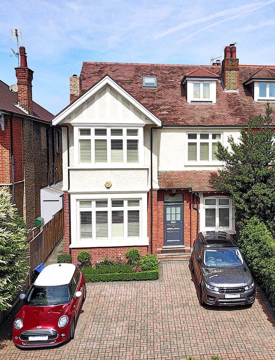 Detached house with new timber windows on every floor