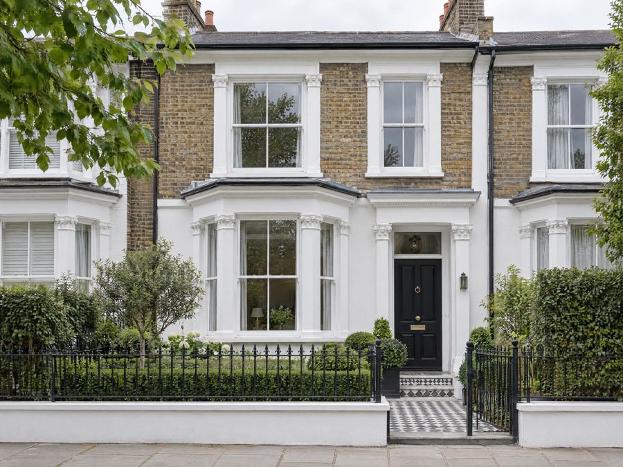 London terrace with white painted box sash windows